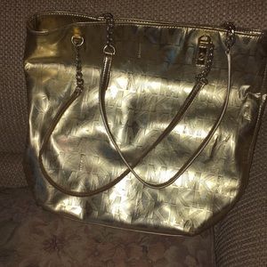 Micheal Kors gold purse